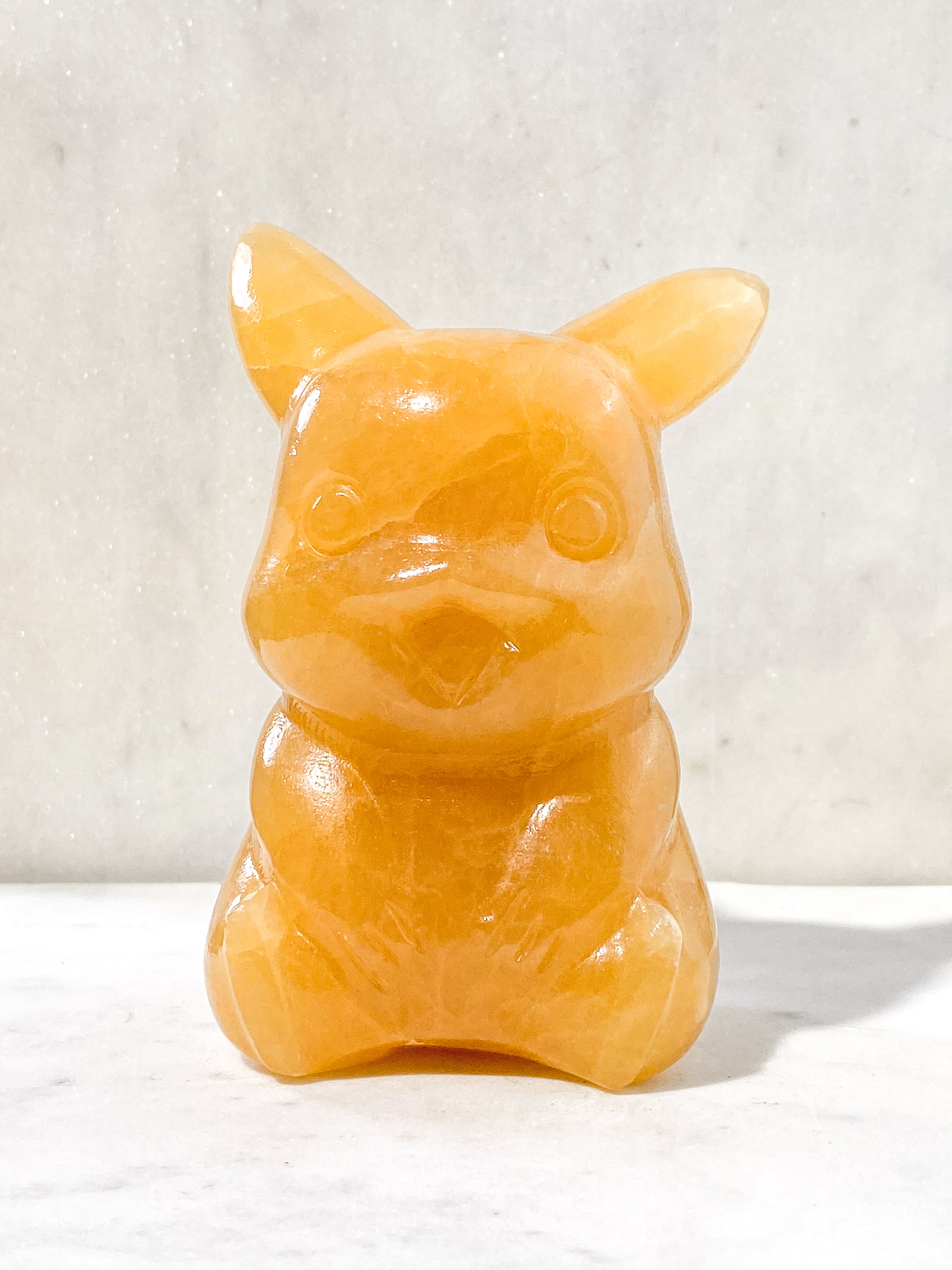 Orange kalcitpumpa med band