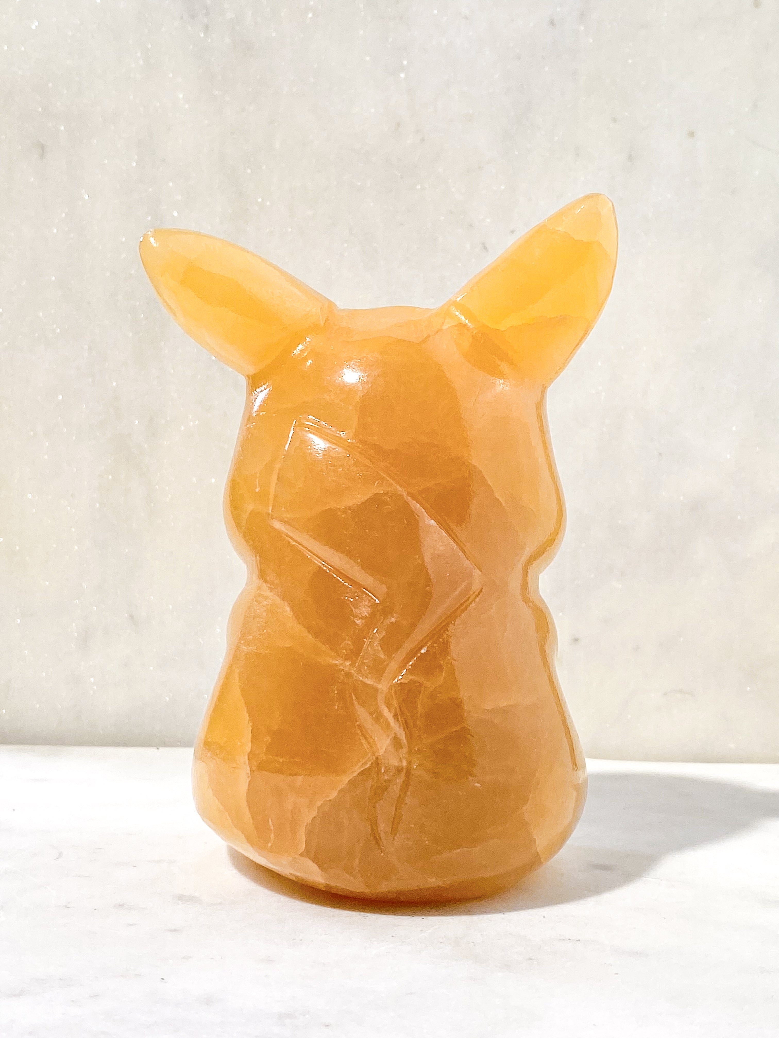 Orange kalcitpumpa med band