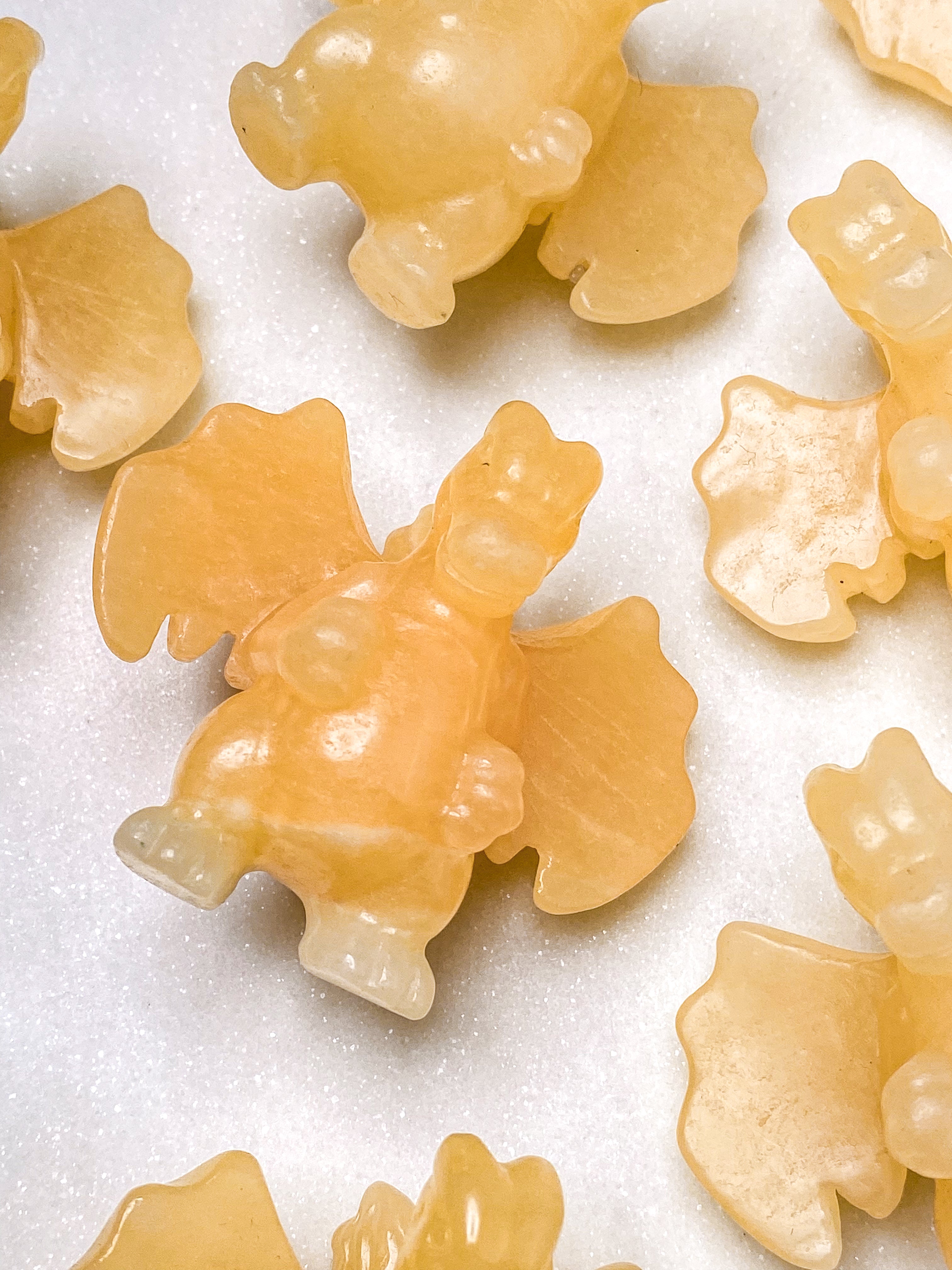 Orange kalcitpumpa med band