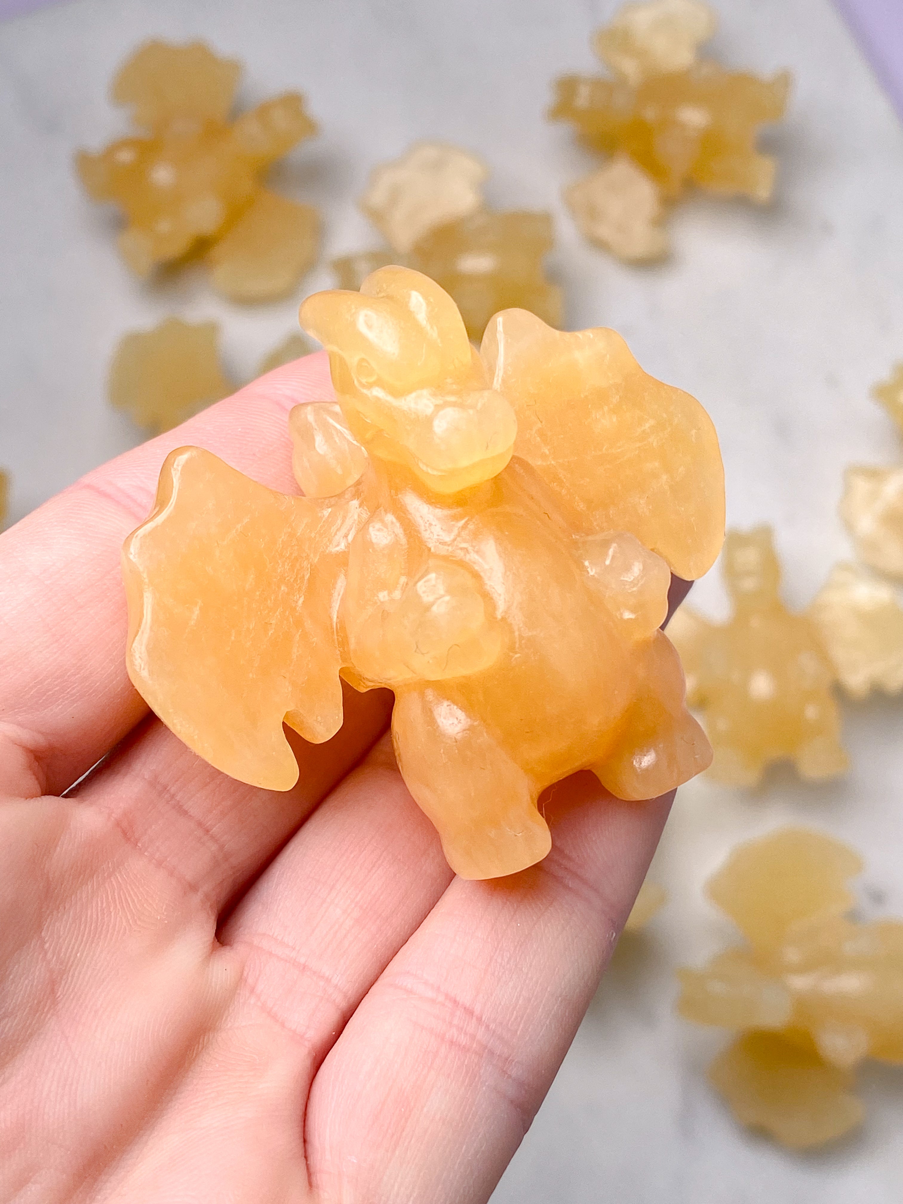 Orange kalcitpumpa med band