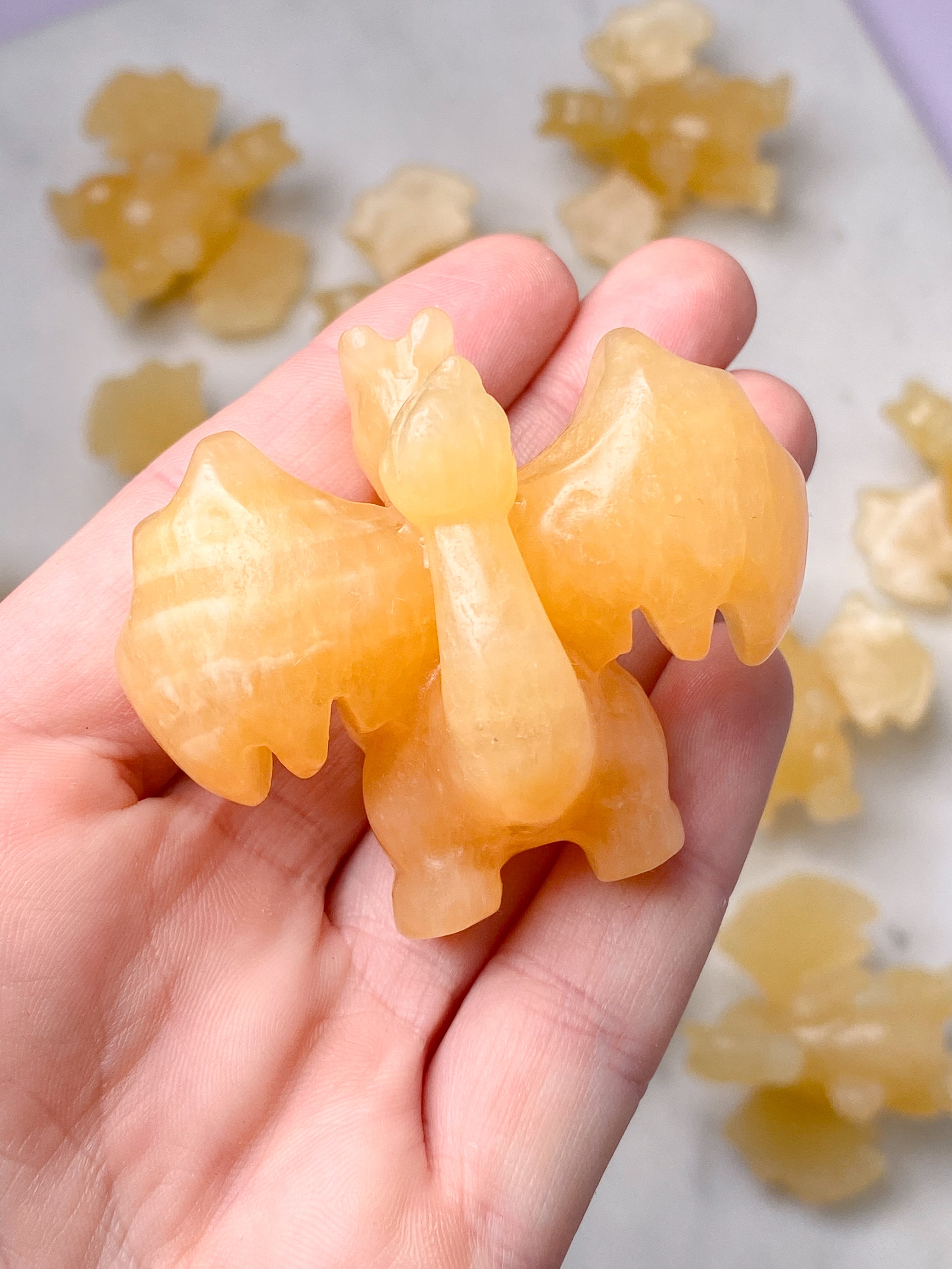 Orange kalcitpumpa med band