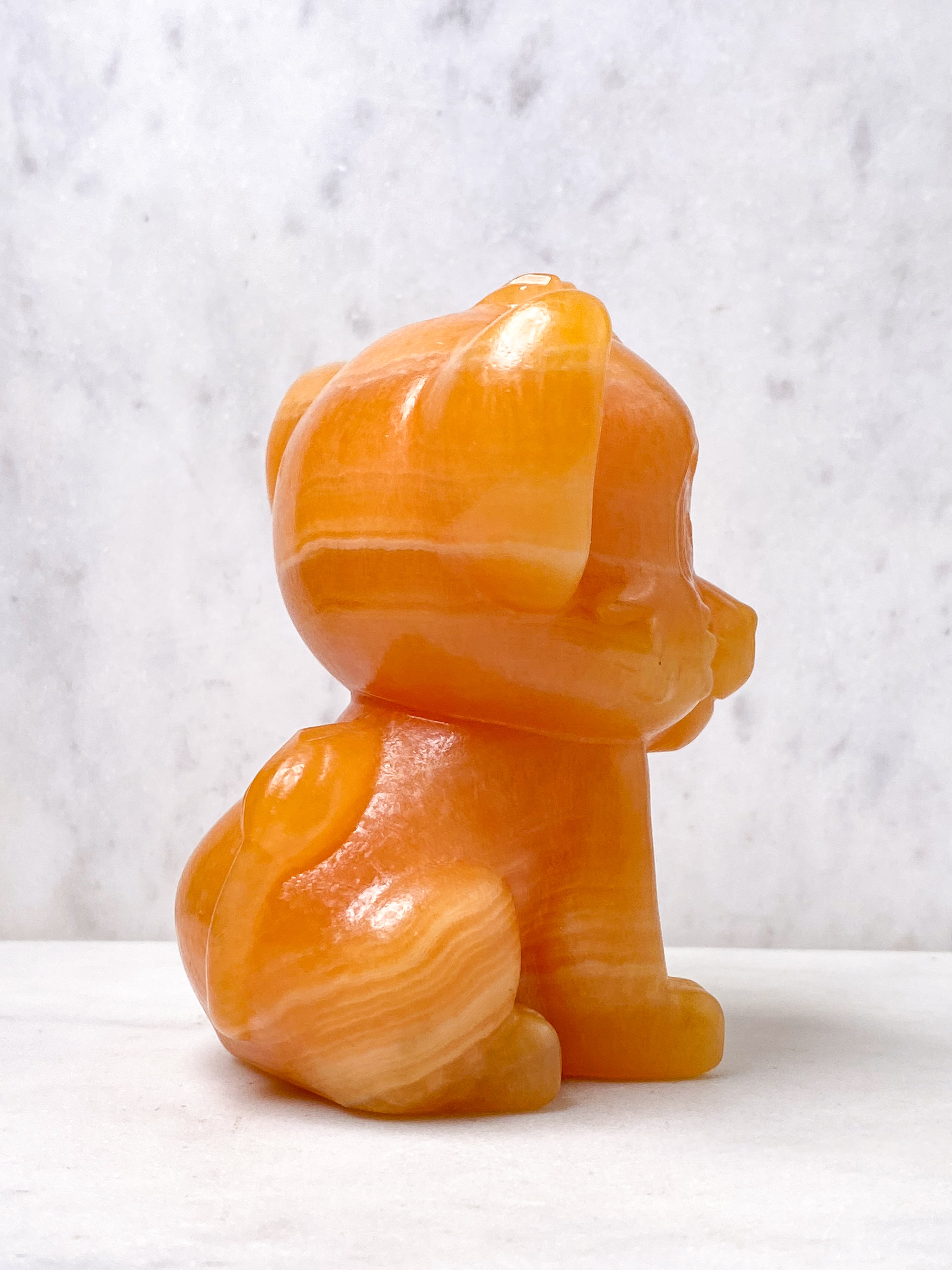 Orange kalcitpumpa med band