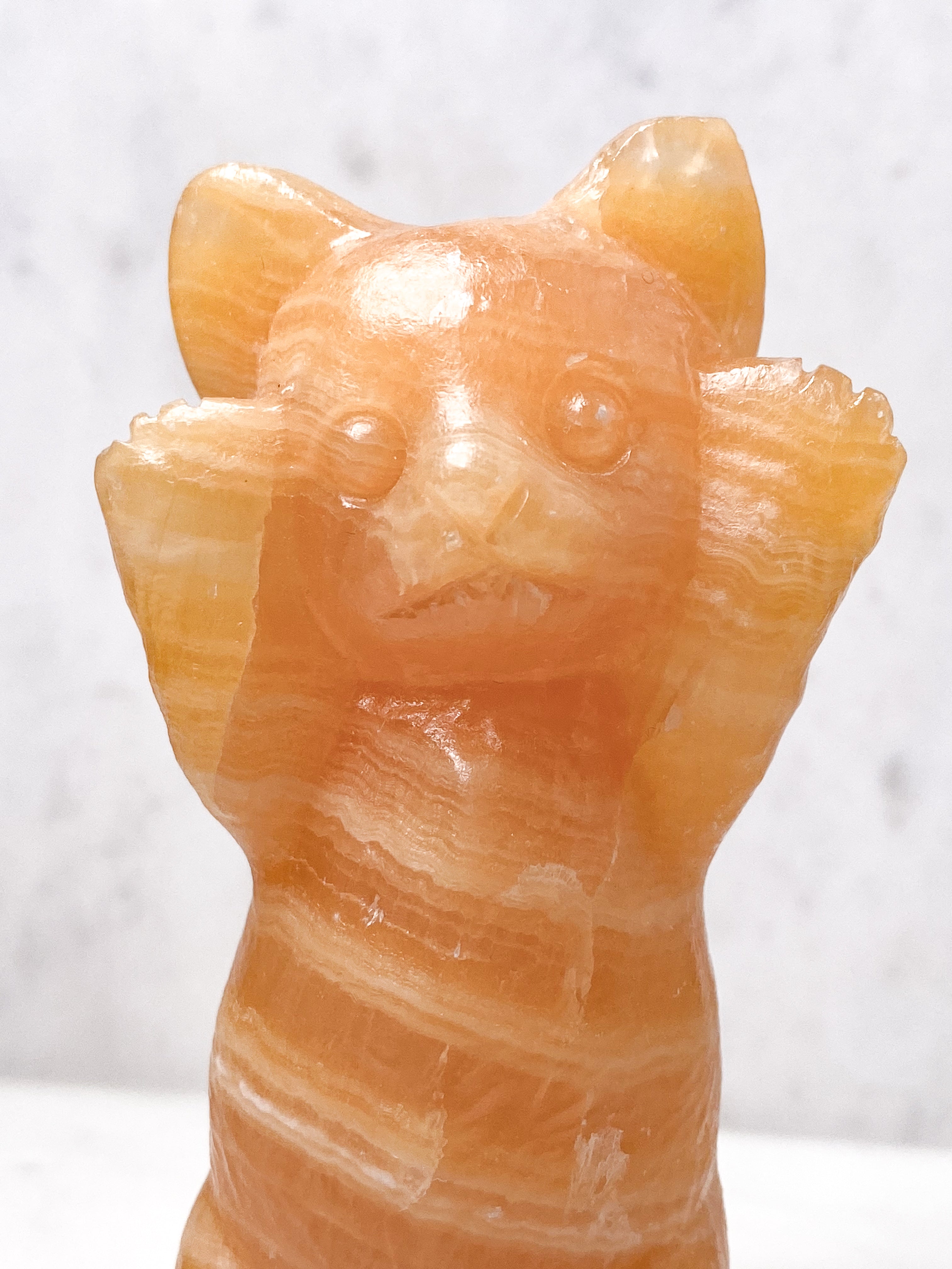 Orange kalcitpumpa med band