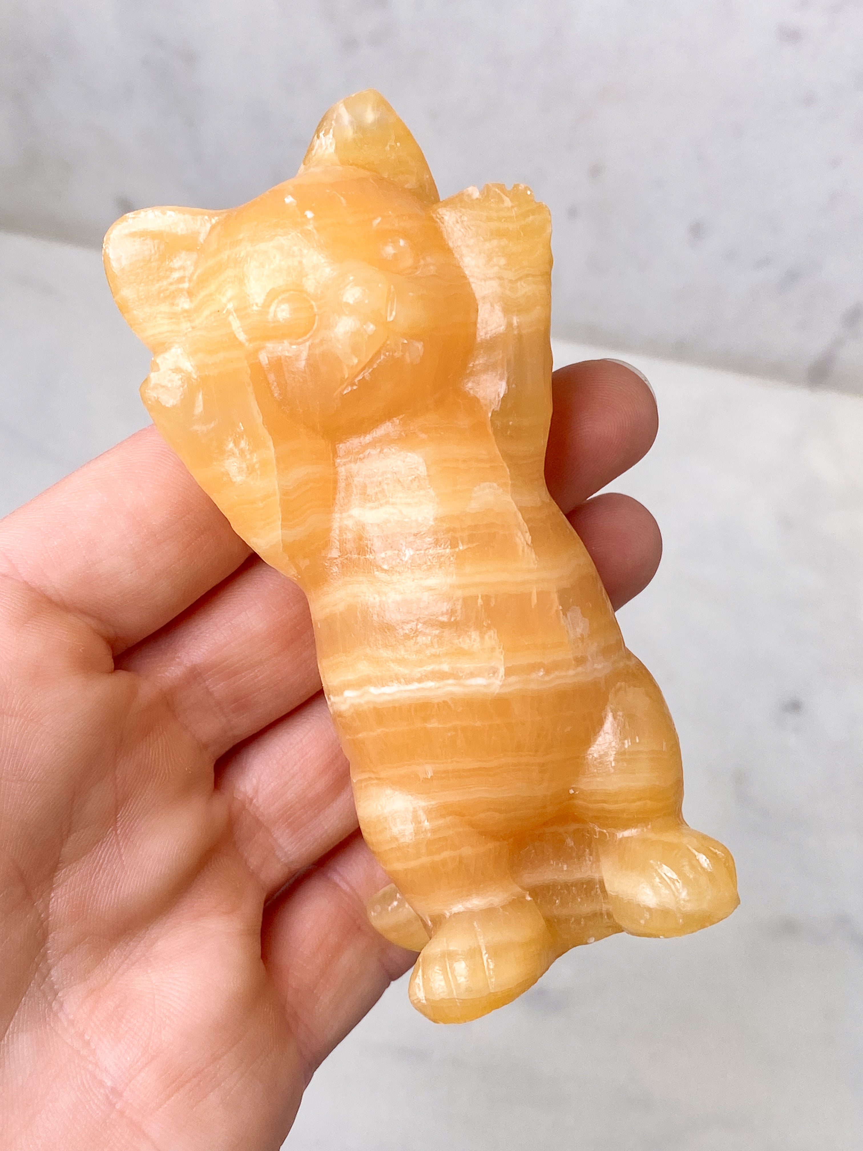 Orange kalcitpumpa med band