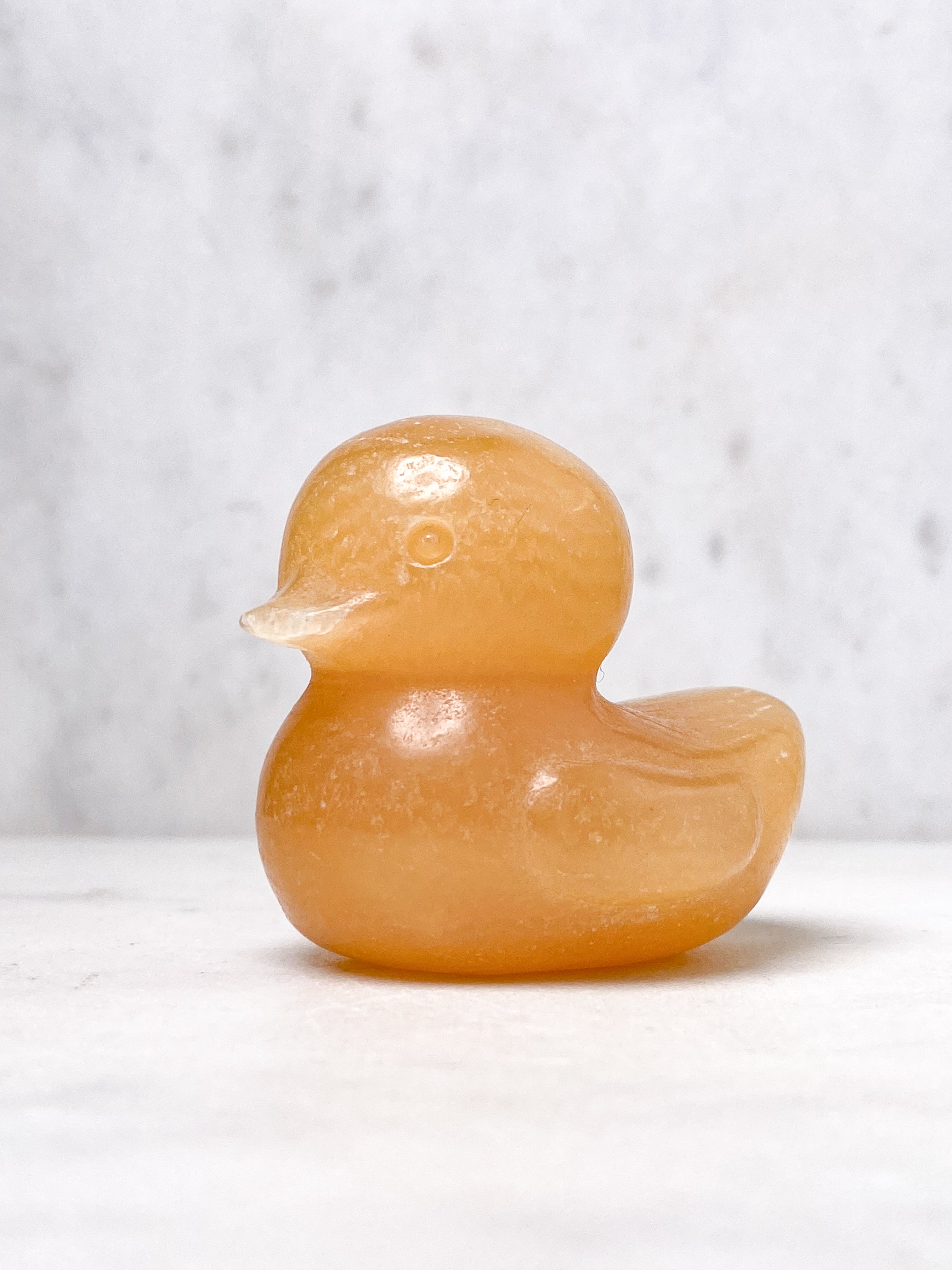 Orange kalcitpumpa med band