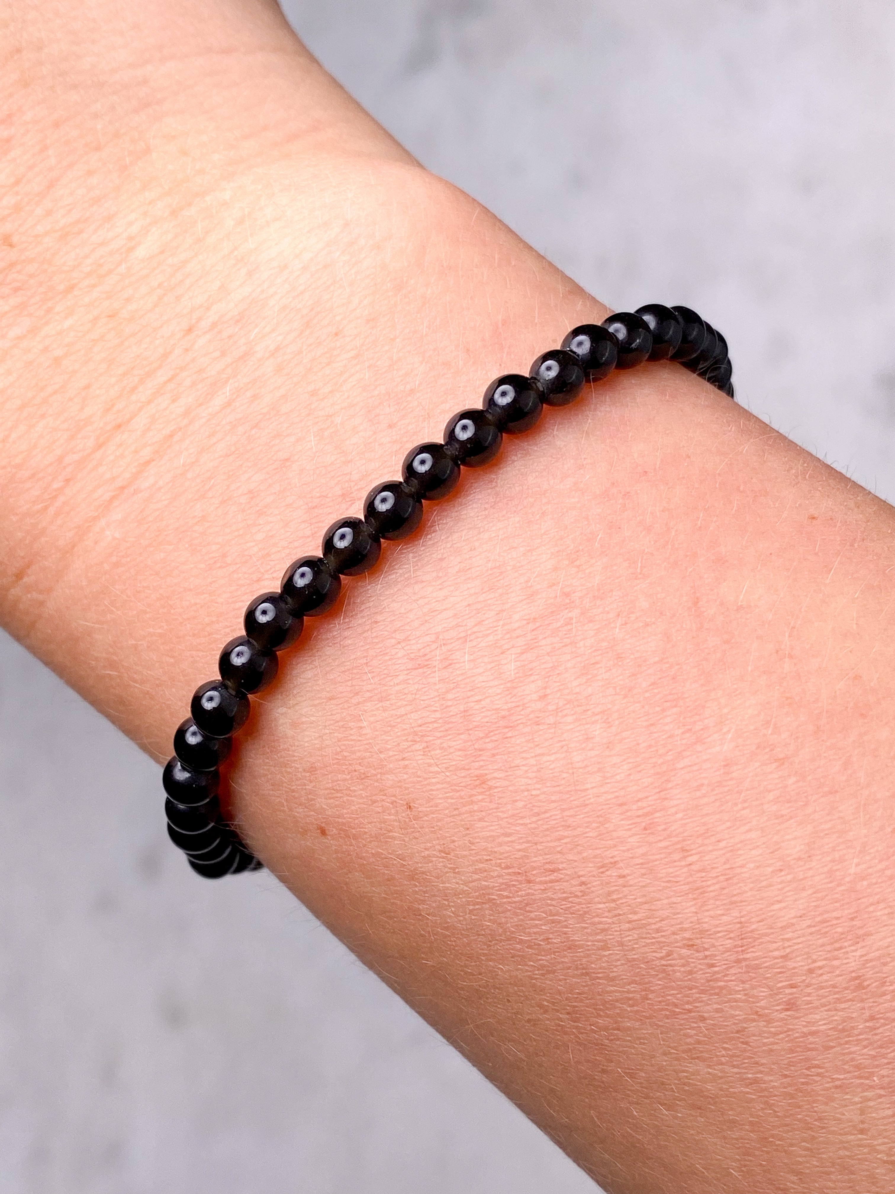 Svart obsidianarmband