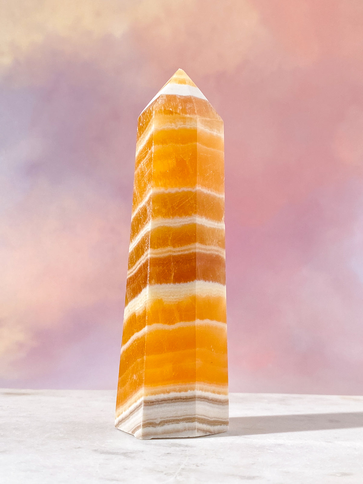 Orange kalcit-torn med band (nr 2)
