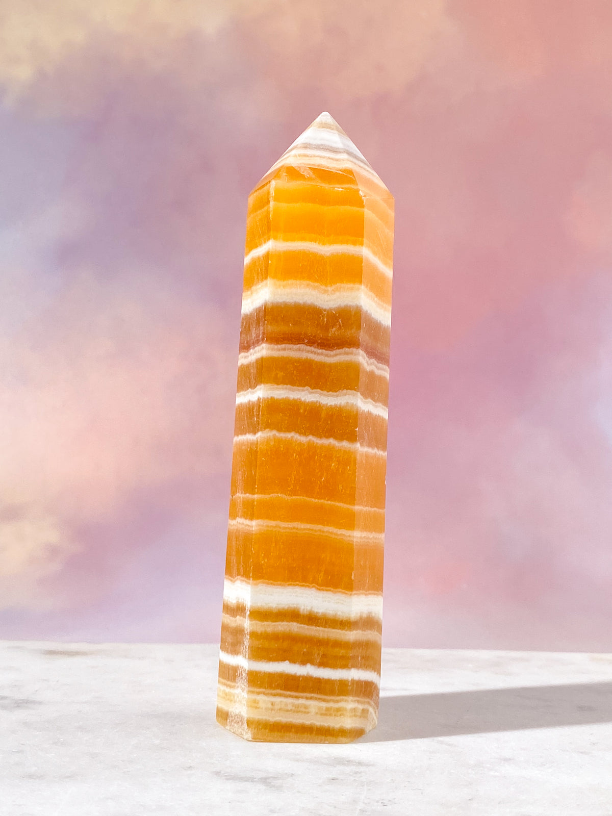 Orange kalcittorn med band (nr 5)