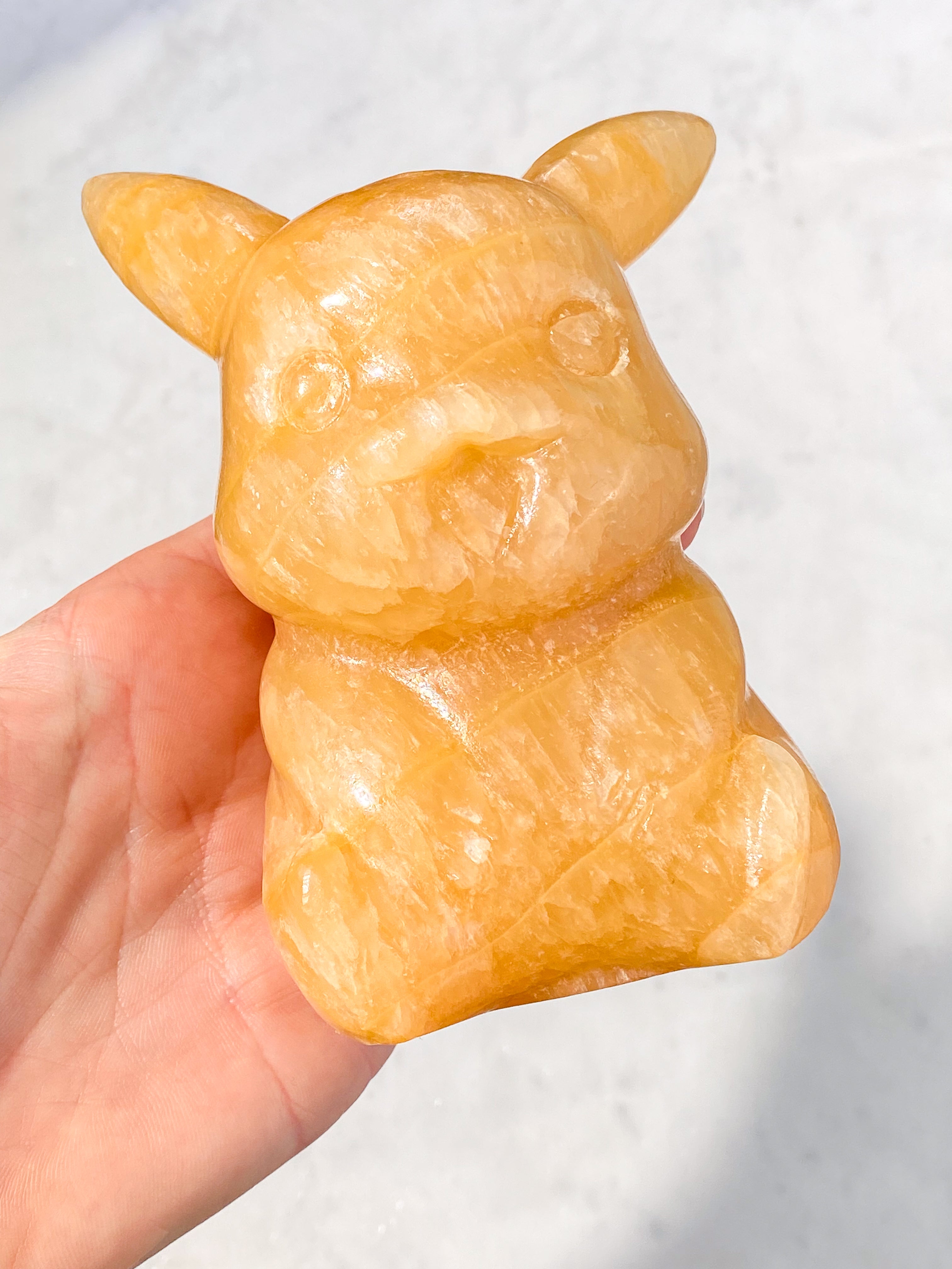 Orange kalcitpumpa med band