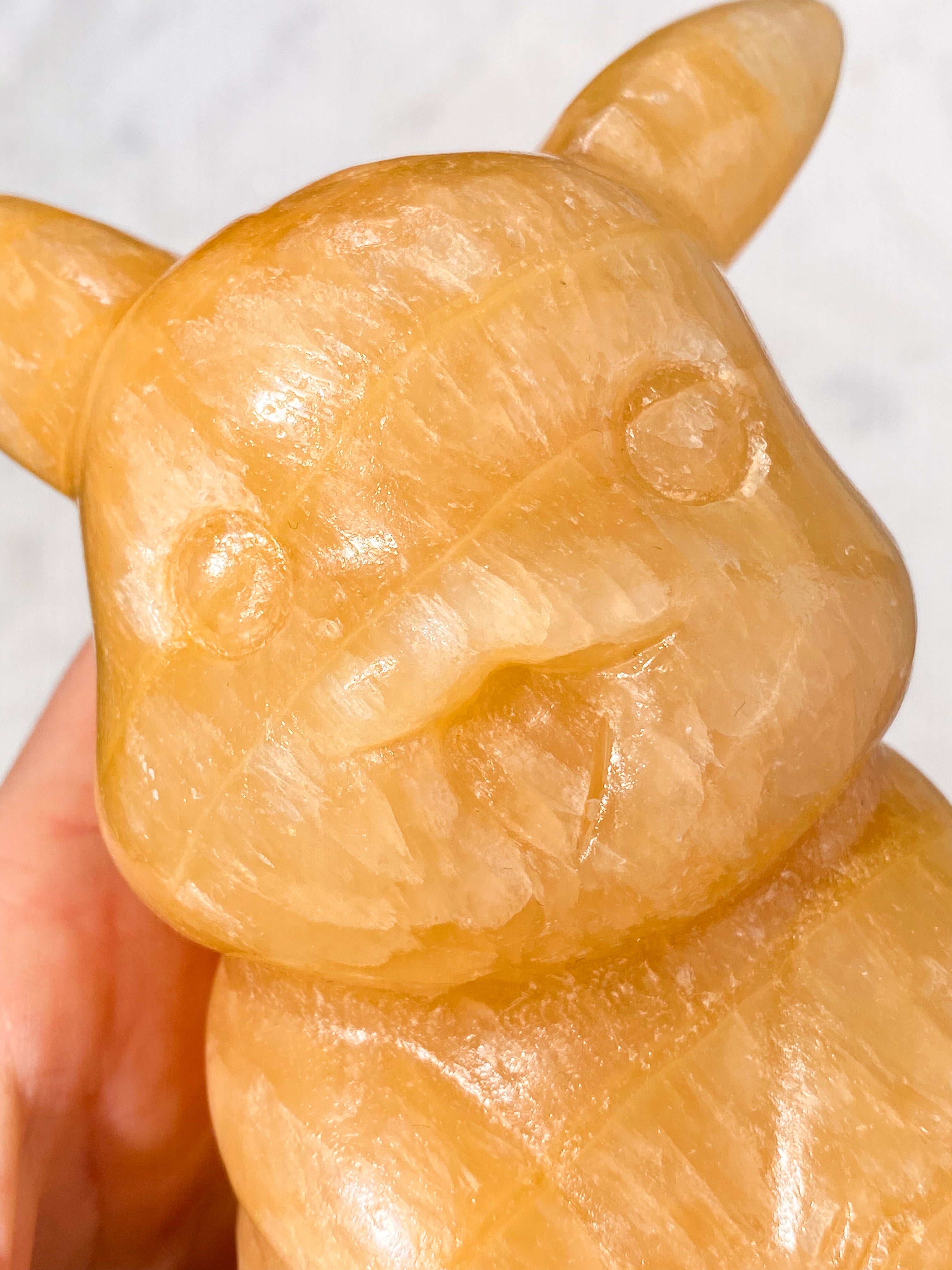 Orange kalcitpumpa med band