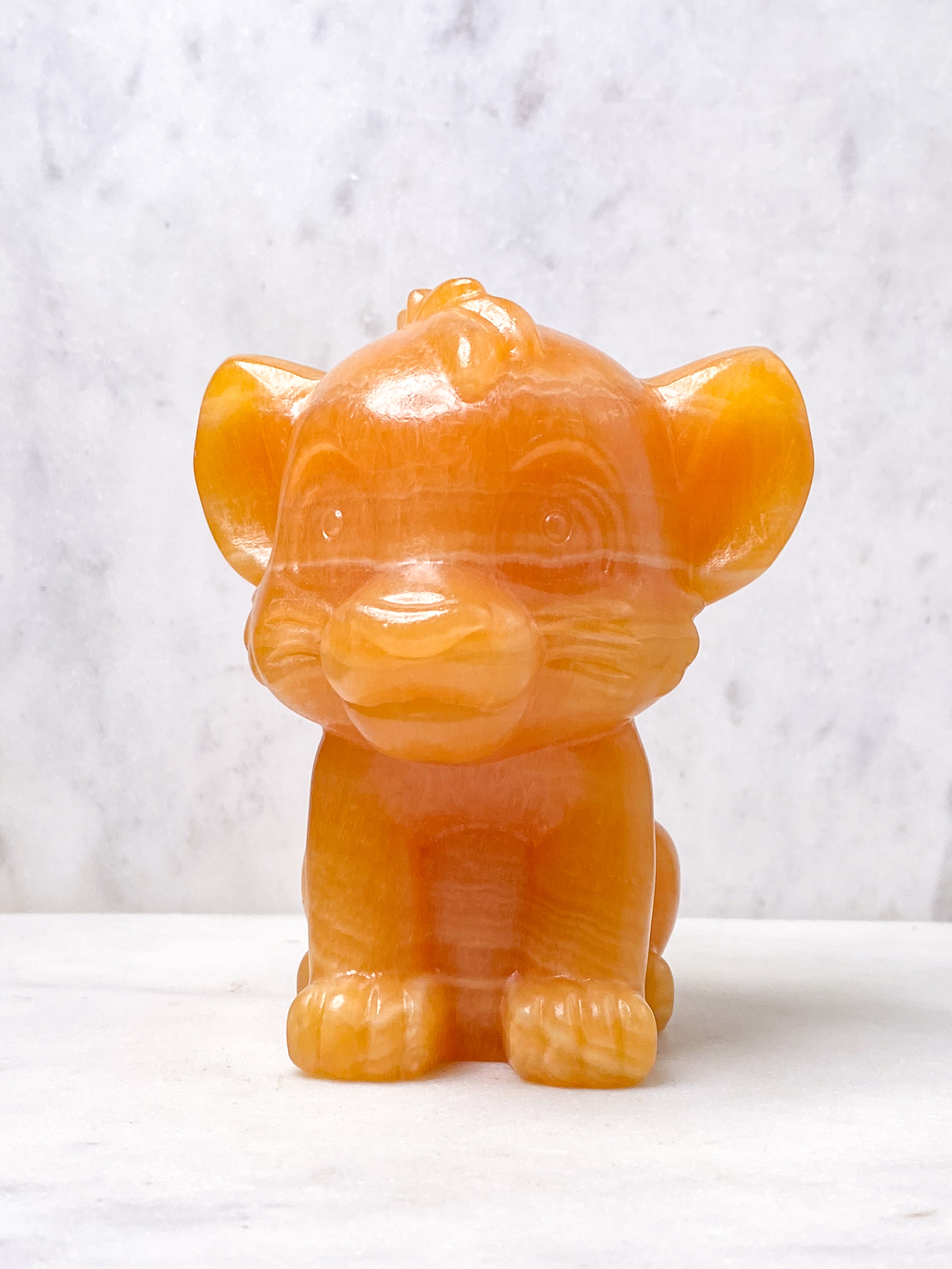 Orange kalcitpumpa med band