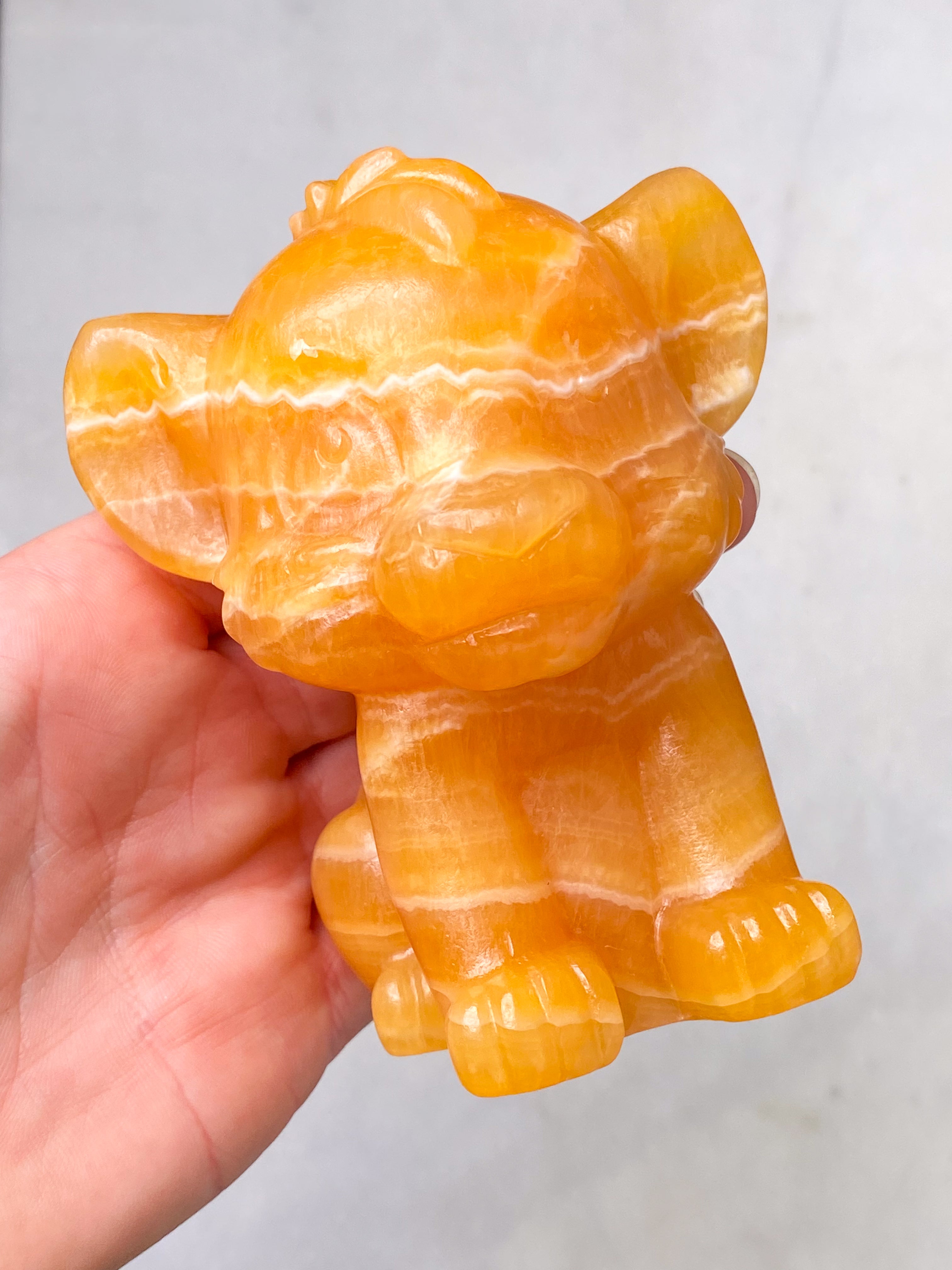 Orange kalcitpumpa med band