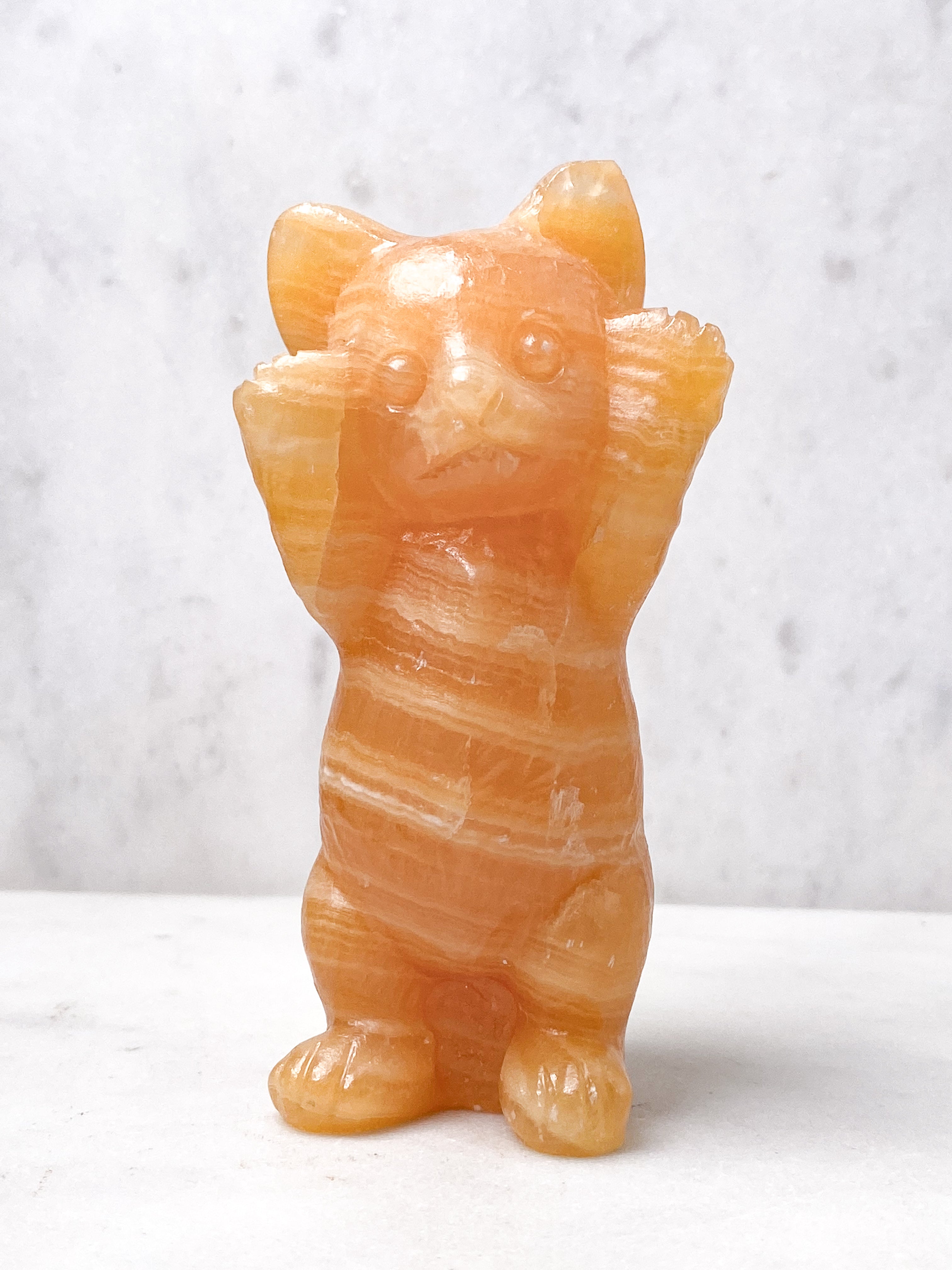 Orange kalcitpumpa med band