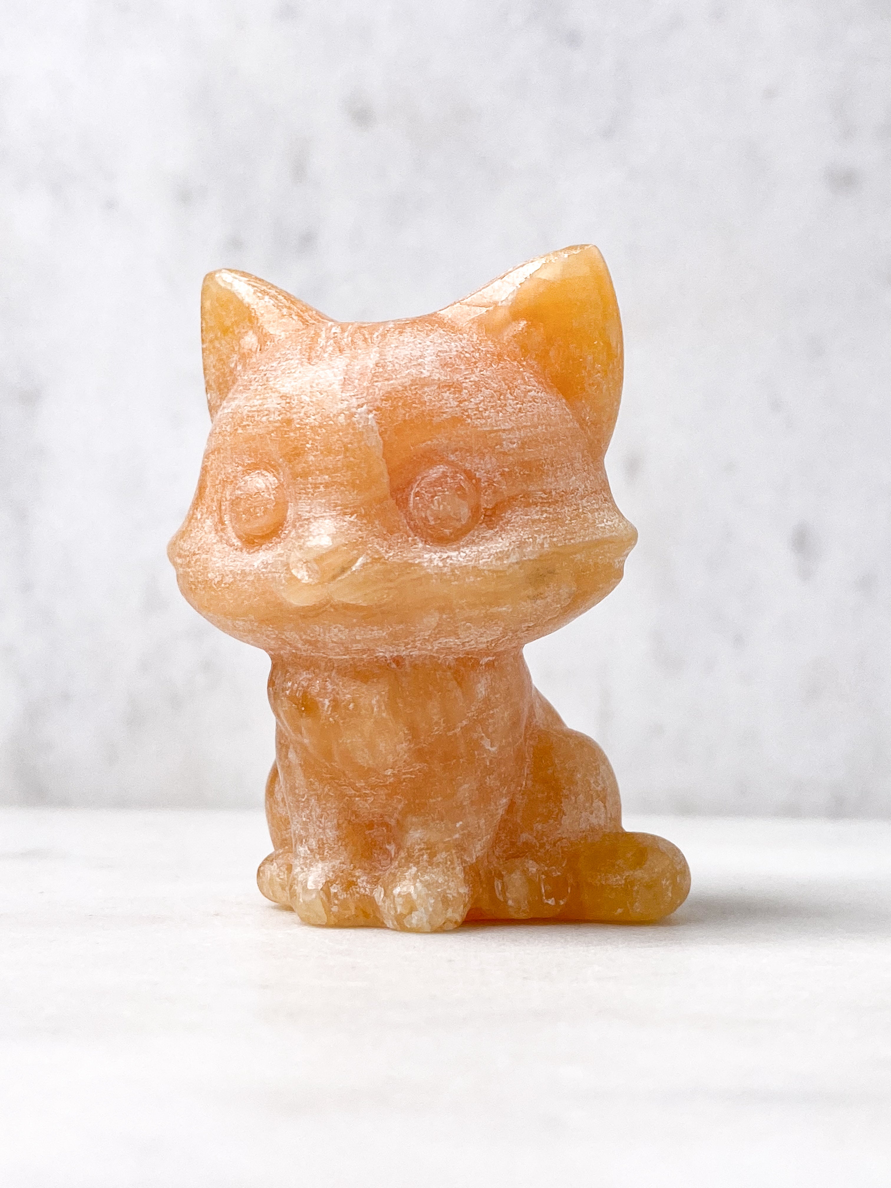 Orange kalcitpumpa med band