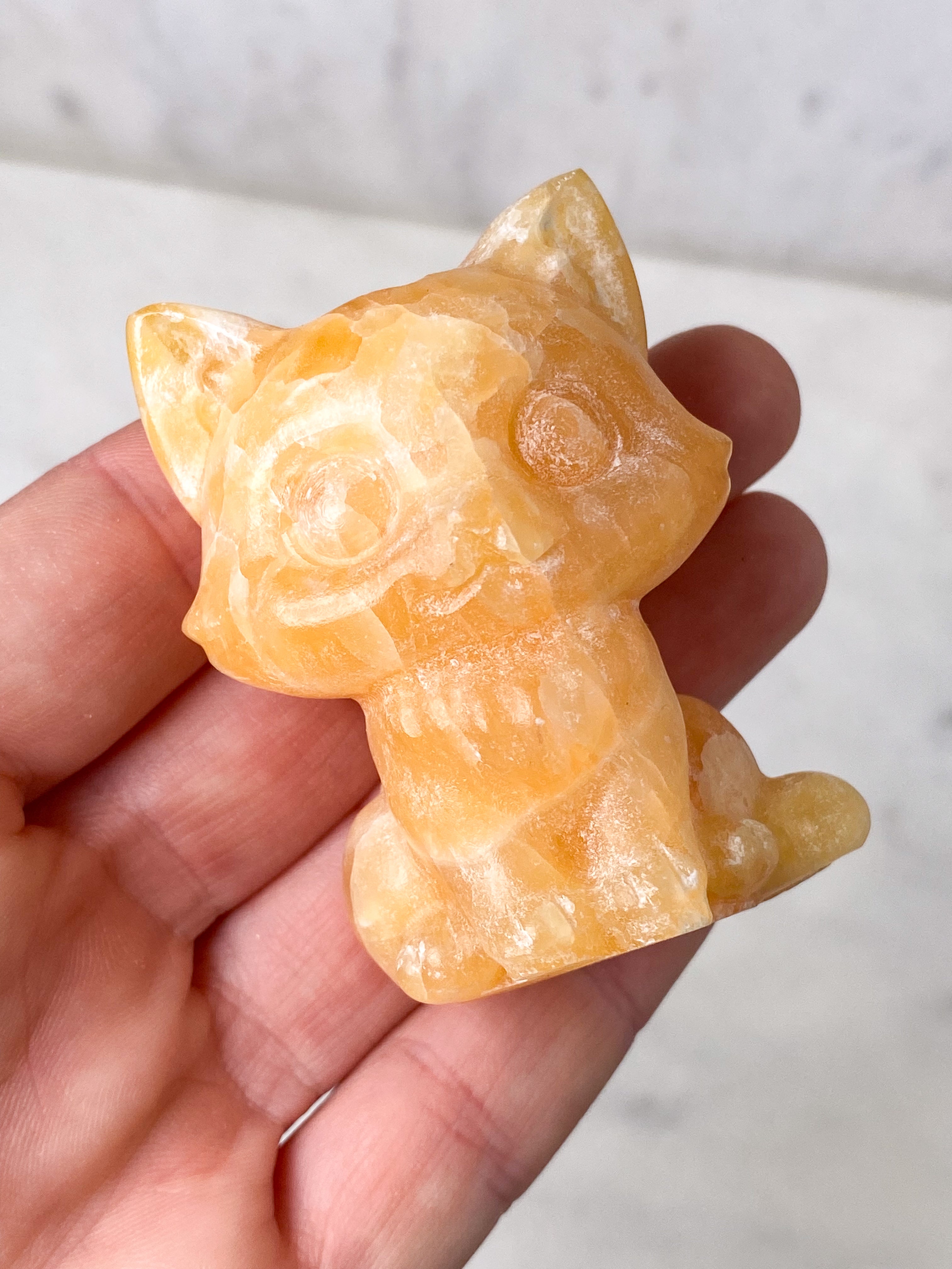 Orange kalcitpumpa med band