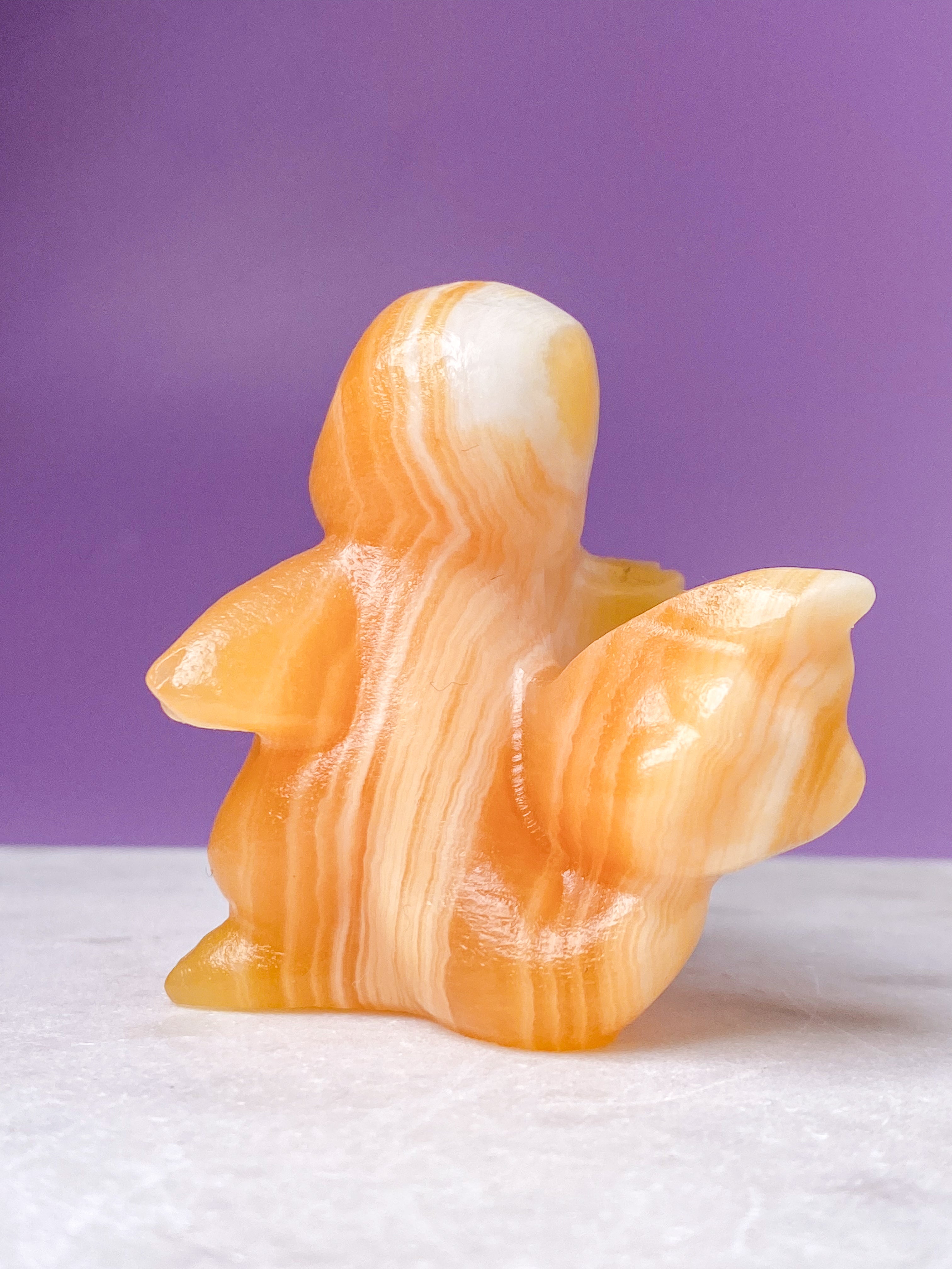 Orange kalcitpumpa med band